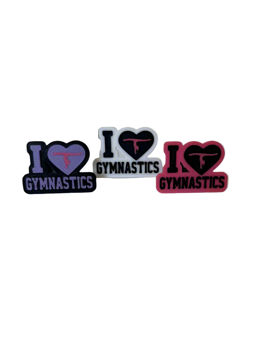 Three 'I ❤️ GYMNASTICS' stickers on a white background